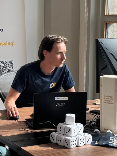 Luc Oudenes working at the office